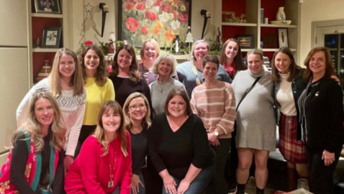 APRIL L. ANDERSON with team