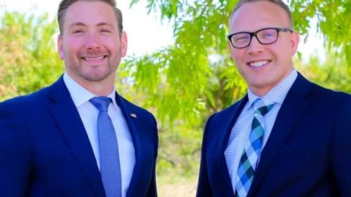 Adam D. Hansen with team