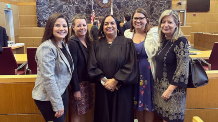 Adriana M. Dinis with team