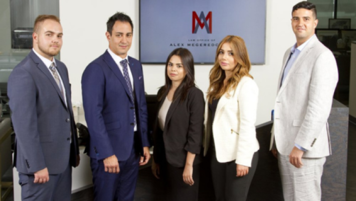 Alex Megeredchian with team