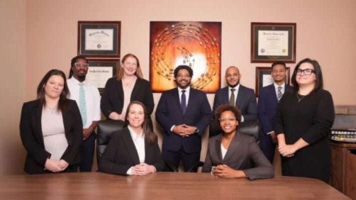 Alfred A. Cave III with His Team Members