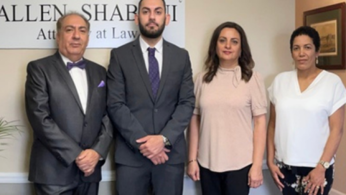 Allen M. Shabani with team