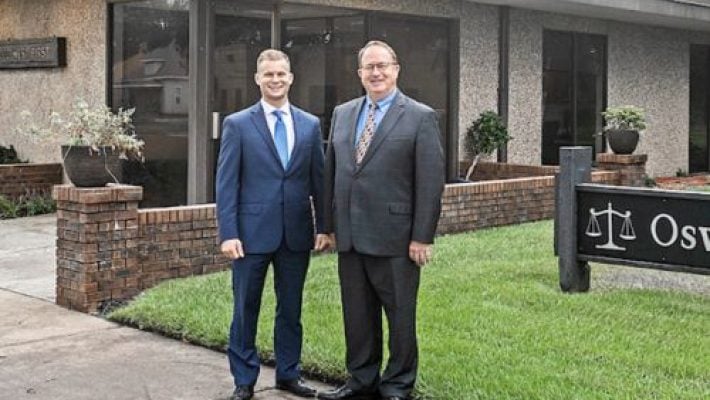 Andrew L. Oswald With Team
