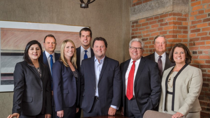 Andrew S. Grossman with team