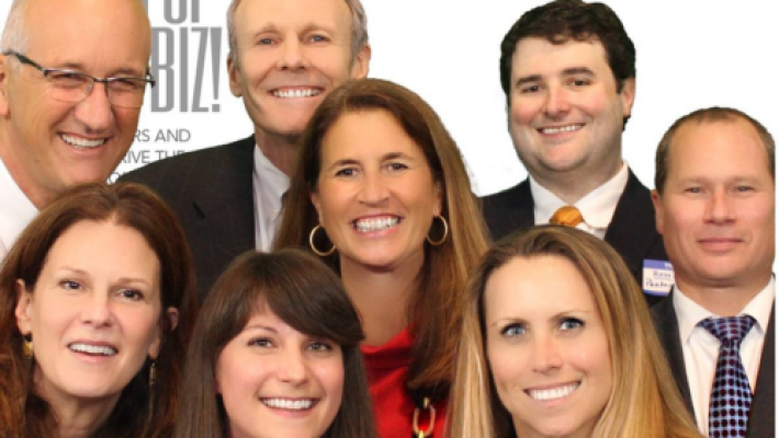 Anne C. Lahren with team