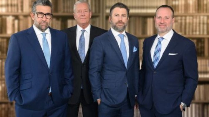 Anthony D. Martino with team