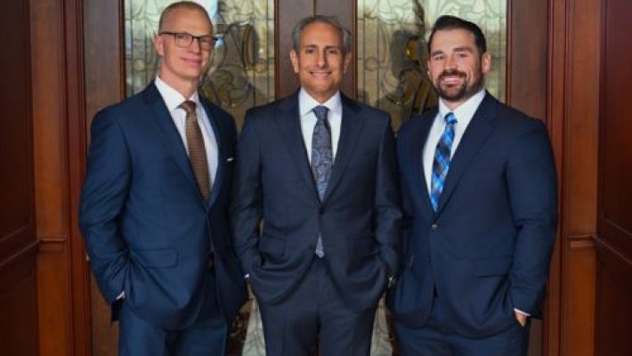 Anthony M. Georgelis with team-mates