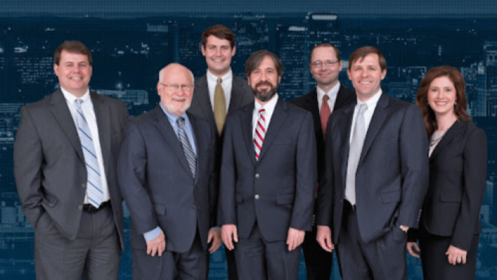Bruce L. Gordon with team