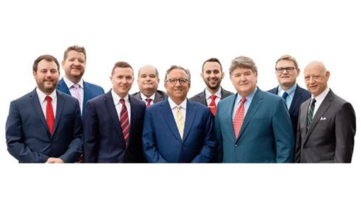 C. Mark Warren with team