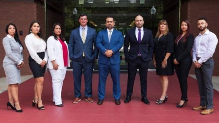 Cameron Simone Roberts with team