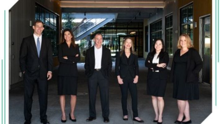 Cate E. Edwards with team