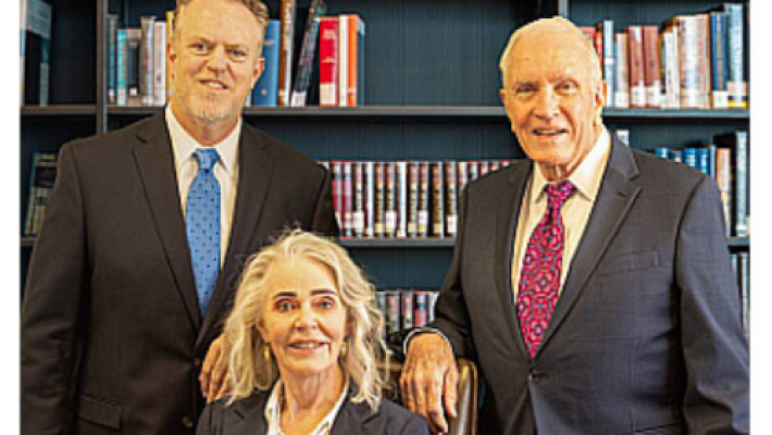 Chadler E. Colgan with team