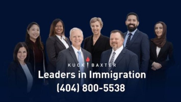 Charles H. Kuck with team