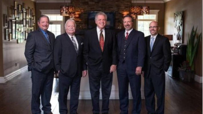 Charles L. “Chuck” Richardson with team