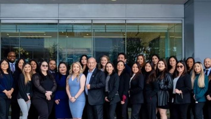 Christine Meneses with team