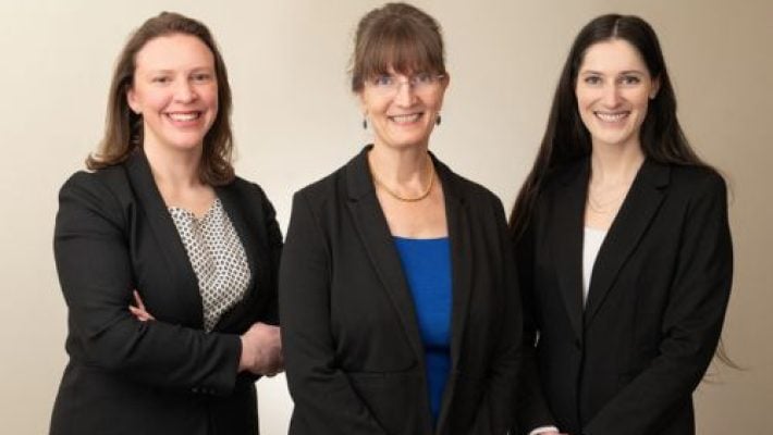 Christine S. Anderson With Team
