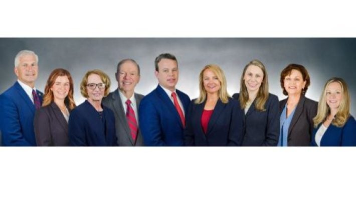 Christophe Clark Emmert with Her Colleagues