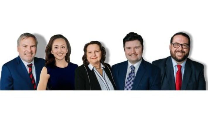 Christopher H. Moore with team