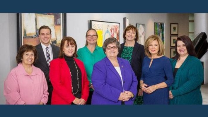 Colleen L. Marshall with team