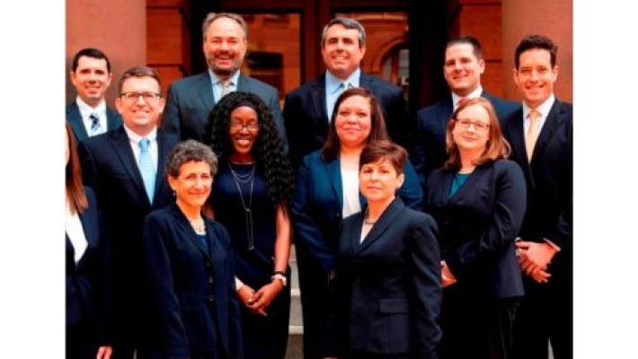 Craig D. Levey with team