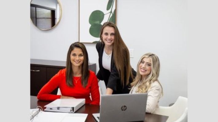 Cristen H. Martinez with team