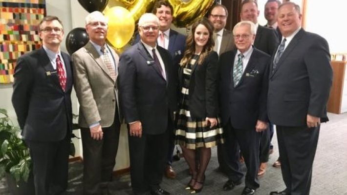 D. Scott Simpson with team