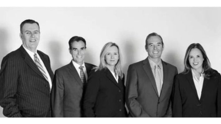 Daniel W. Munley with team