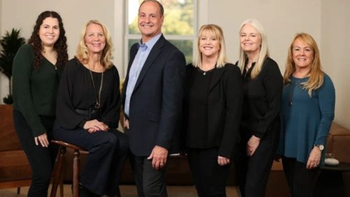 Daryl Reese with team