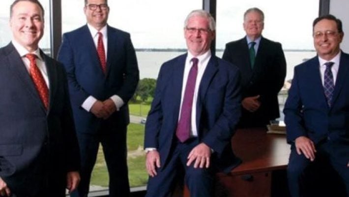 David J. Volk with team