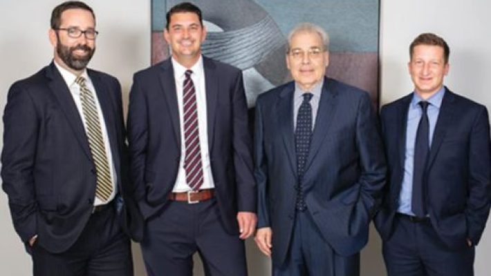 Dennis E. Horvath With Team