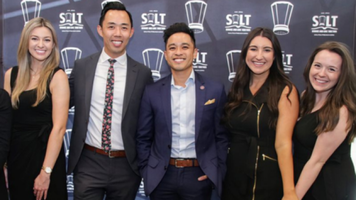 Don H. Nguyen with team