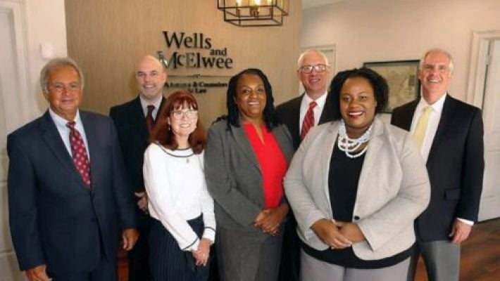 Donald T. Wells Jr. with team