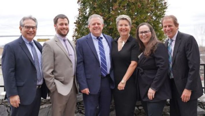 Donna M. Nesselbush With Team