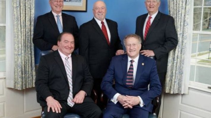 Edward L. Weiner With Team