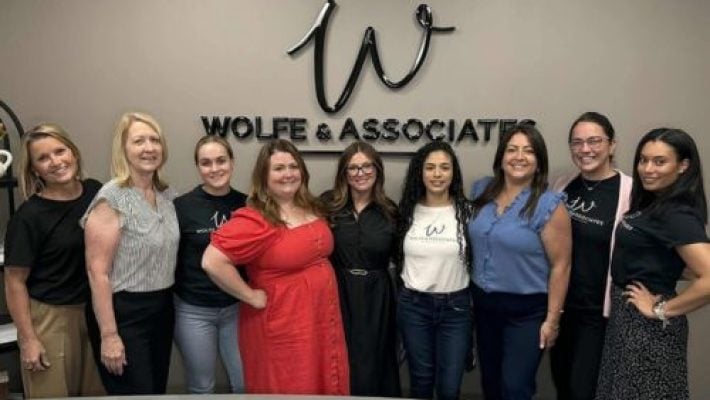 Erica M. Wolfe with team