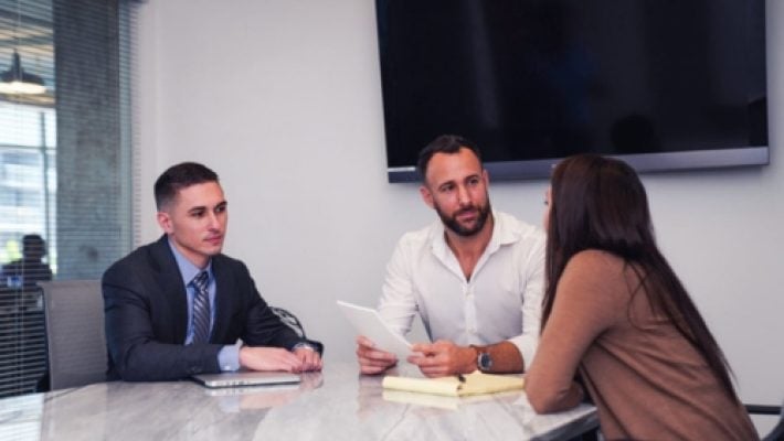Ethan Wall with team members