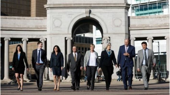 Gregory A. Gold with team