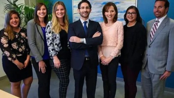 Hart J. Levin with team