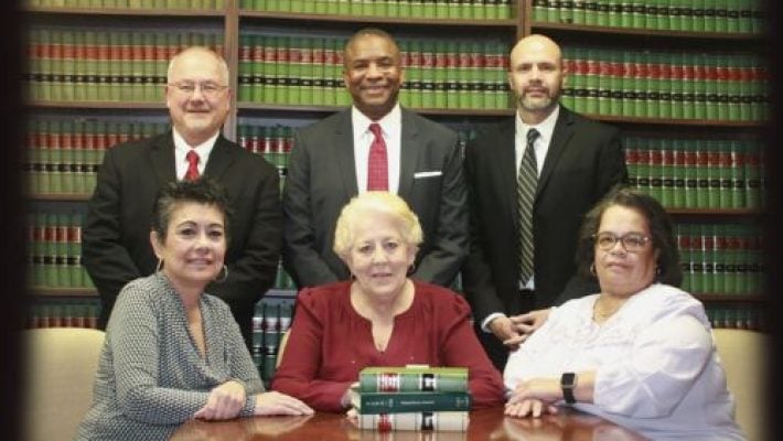 Henry Apryasz with His Team Members