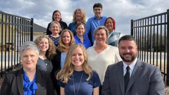 Holly Simpson With Colleagues