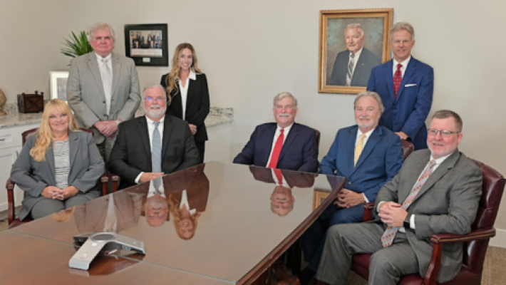Hugh D. Keating with team