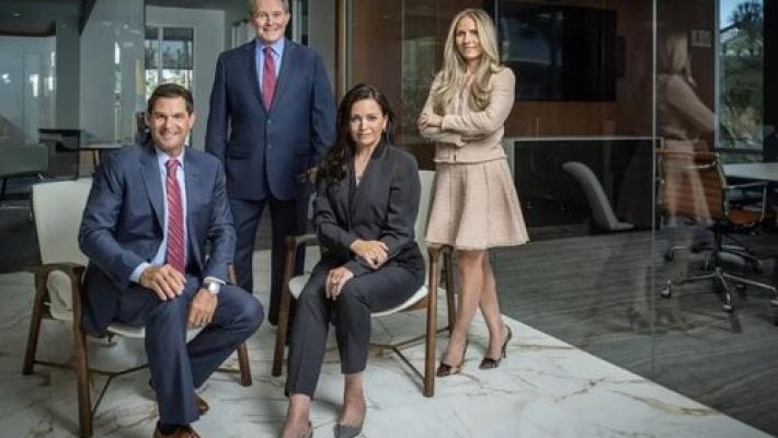 James R. Rosen with team