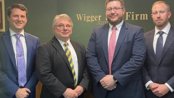 Jarrel L. Wigger with team