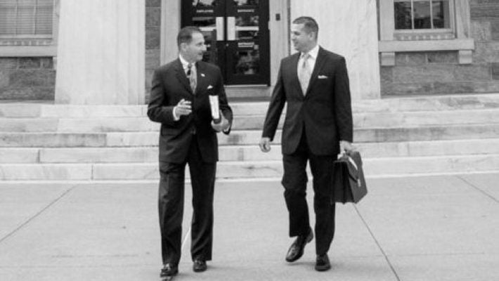 Jason E. Cuomo with team