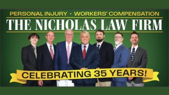 Jeffrey C. Nicholas with team