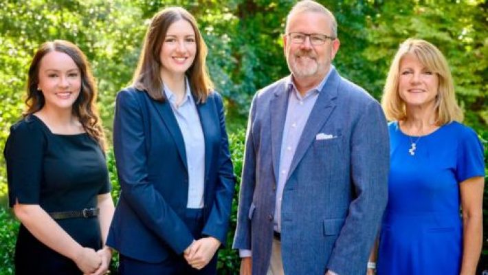 Jennifer E. Ghorley with team