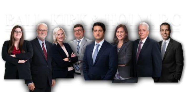 Jennifer L. Chase with team