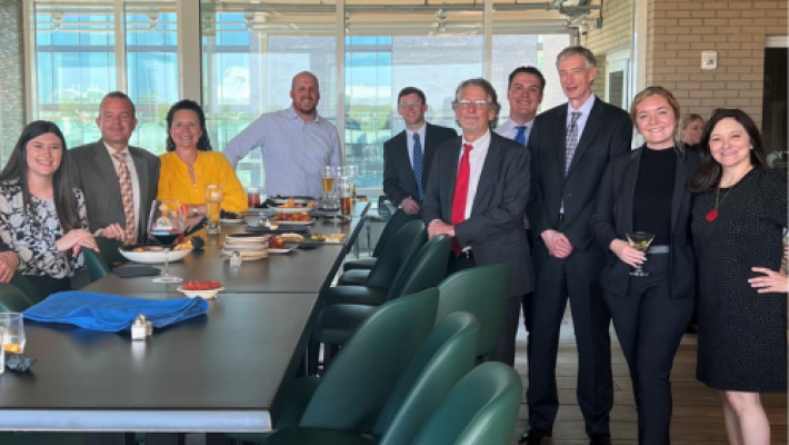 John P. Brice with team