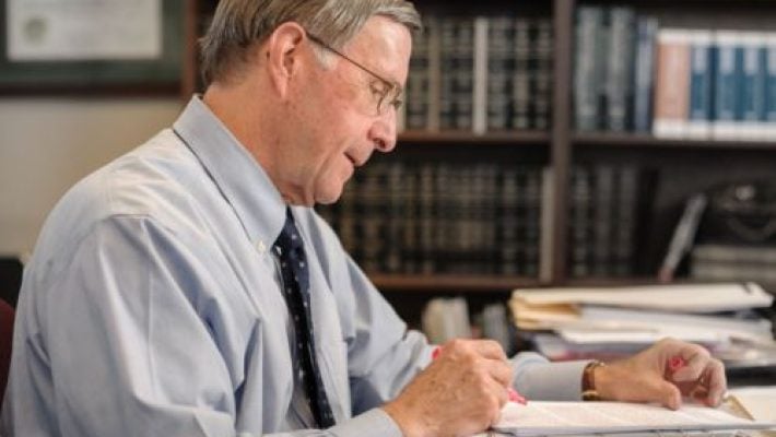 John R. Wynn at work