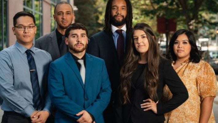 Josiah M. Young with his team